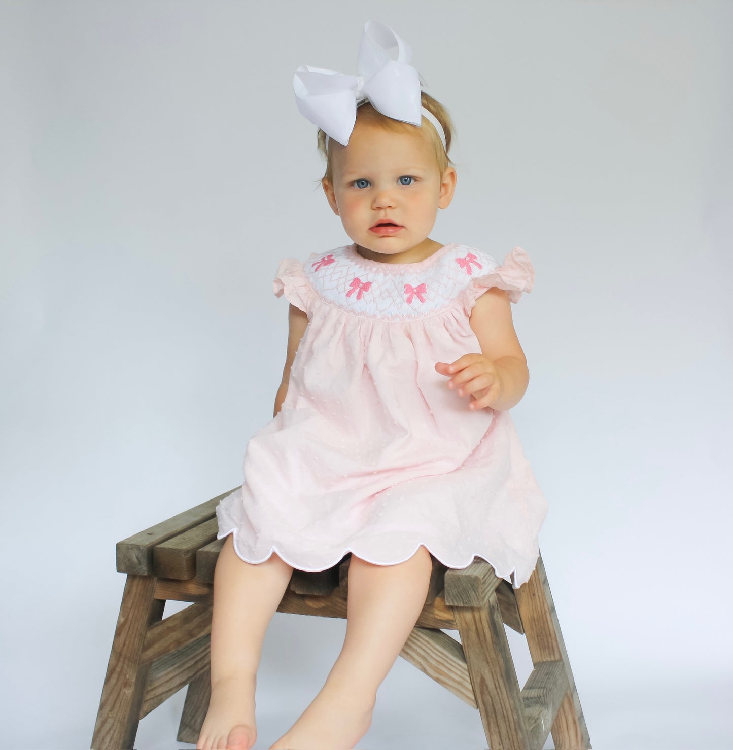 Hand Smocked Pink Swiss Dot Pearl Bow Dress
